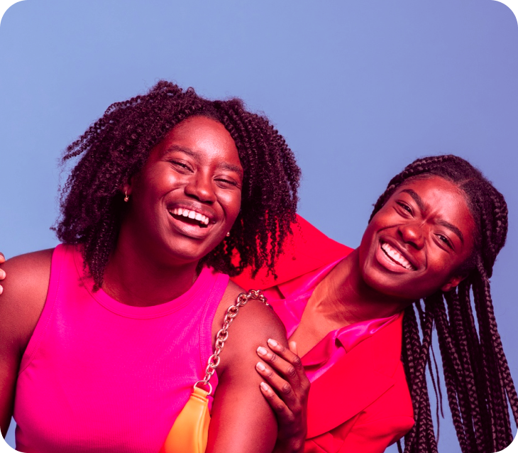 Two friends laughing together