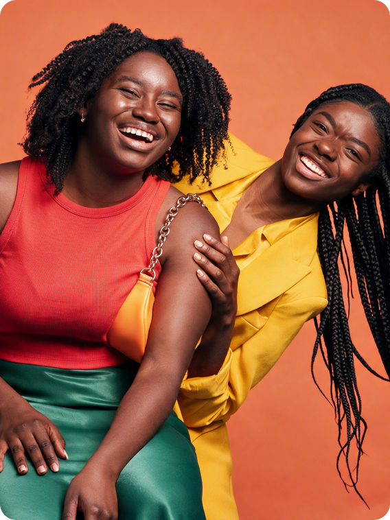 Two friends laughing together